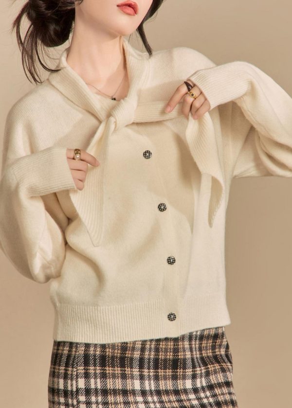 Women Beige Bow Button Solid Knit Sweaters Winter Online Hot Sale