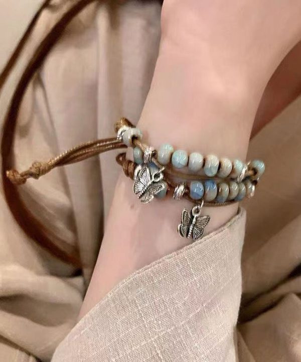 Casual Alloy Weaving Ceramic Butterfly Charm Bracelet Two Piece Set For Sale